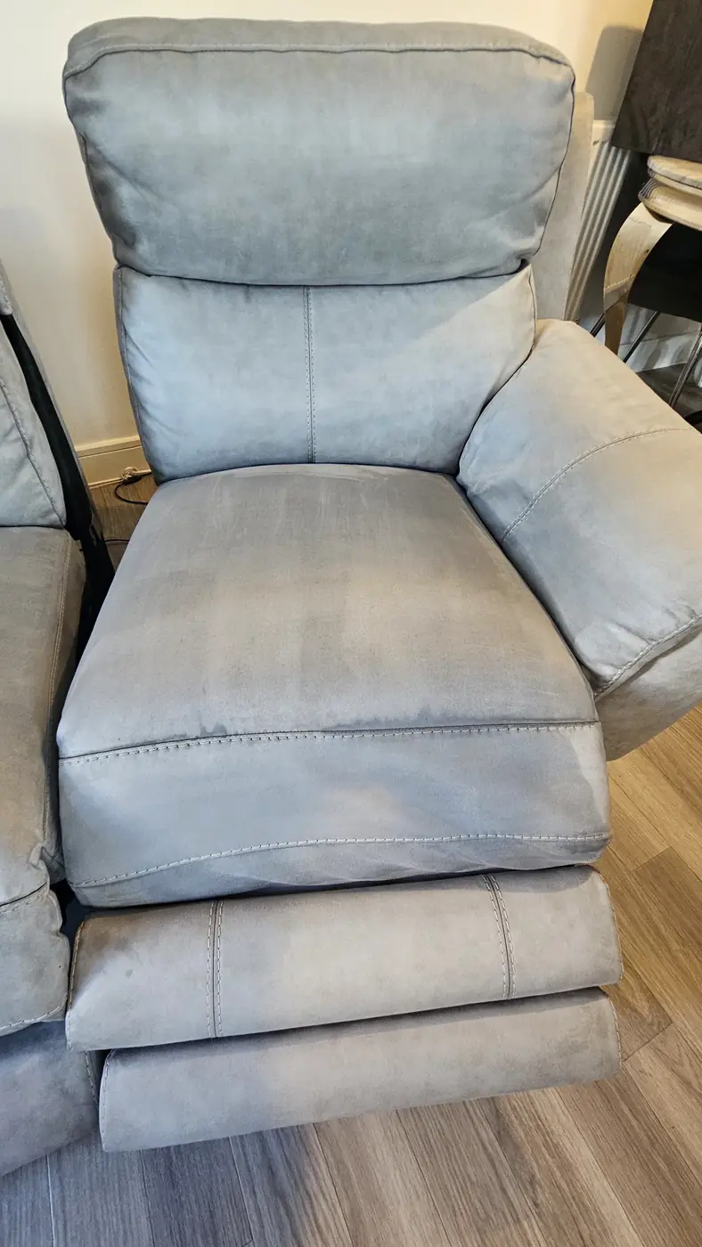 Grey fabric recliner after cleaning